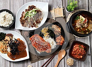 Assorted food of Curry Pork Chop Rice, Kimchi, Korean Jajangmyeon, Beef miso soup, Chicken Chop Bento, served dish isolated on