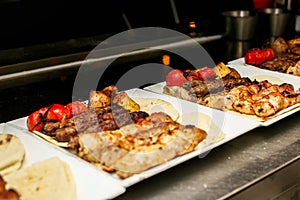 Assorted Food Trays Displaying a Variety of Cuisines photo