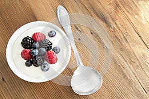 Assorted fresh berries with creamy yogurt