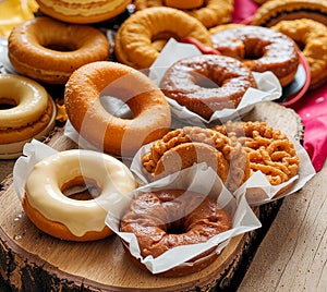 Assorted Fresh Donuts on Rustic Wooden Display