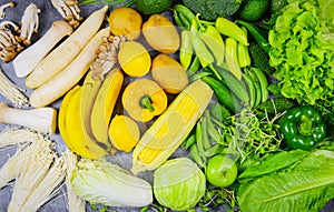 Assorted fresh ripe fruit yellow white and green vegetables mixed selection various mushrooms , top view - vegetables and fruits
