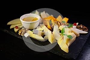 Assorted fruit on a black background