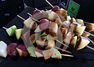 Assorted fruits on skewers