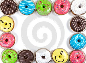 Assorted glazed doughnuts in different colors