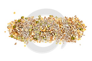 Assorted grains and pulses heap on white, top view. Winter food includes split peas, red and yellow lentils, pearl