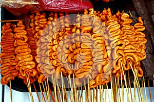 Assorted grilled pork and chicken innards barbecue at a street food stall