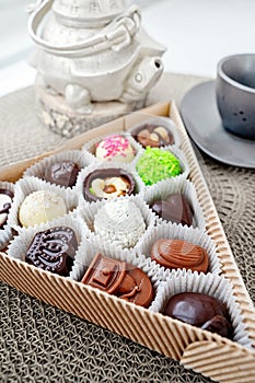 assorted handmade sweets, Swiss chocolates in gift box, various luxury pralines made of dark and milk organic chocolate