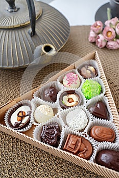 assorted handmade sweets, Swiss chocolates in gift box, various luxury pralines made of dark and milk organic chocolate