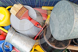 Assorted household items in cluttered space