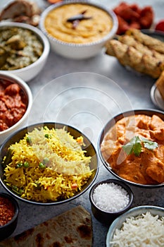 Assorted indian food on stone background. Dishes of indian cuisine