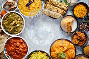 Assorted indian food on stone background. Dishes of indian cuisine