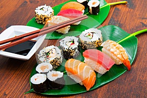 An assorted japanese sushi food. All you can eat menu. Maki and rolls with salmon, tuna and shrimp