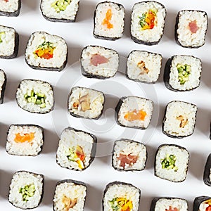 Assorted japanese sushi on white background. View from above.
