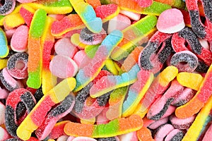 Assorted juicy colorful gummy candies. Top view.
