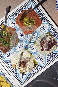 Assorted lebanese dips in a plate