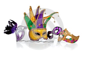 Assorted mardi gra masks on white