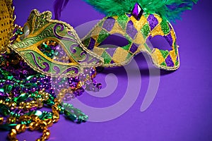 Assorted Mardi Gras or Carnivale mask on a purple background