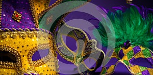 Assorted Mardi Gras or Carnivale mask on a purple background