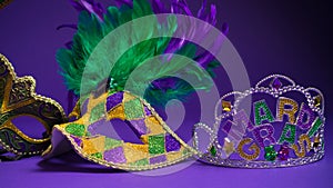 Assorted Mardi Gras or Carnivale mask on a purple background