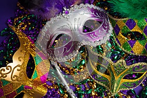 Assorted Mardi Gras or Carnivale mask on a purple background