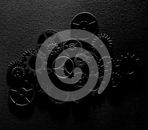 Assorted metal machine gears and components background
