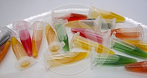 Assorted microcentrifuge tube for PCR analysis with red, yellow and green liquid
