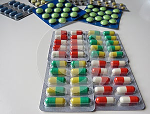 Assorted multi-colored tablets of pharmaceutical medicine