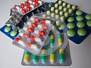 Assorted multi-colored tablets of pharmaceutical medicine