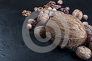 Assorted nuts on a black background