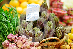 Assorted organic artichokes sold on a marketplace in Genoa, Italy