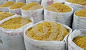 Assorted pasta in plastic bags at farmers market, Sucre, Bolivia