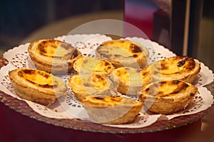 Assorted Pastel De Nata Pastries Elegantly Displayed photo