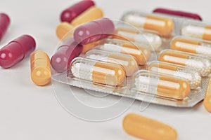 Assorted pharmaceutical medicine pills and capsules. Pills background. Heap of assorted various medicine tablets and