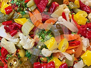Assorted pickled vegetables displayed at medina souks in Morocco photo