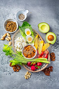 Assorted raw snack vegetables with dip sauce, healthy fresh food platter