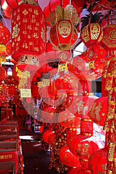 Assorted red Chinese lanterns with auspicious characters `fu`, `xi`, `cai` to bestow fortune, happiness for the New Year