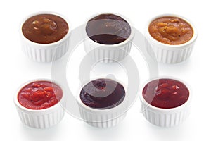 Assorted Rub and Marinade Sauce on White Saucers