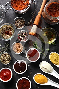 Assorted Seed Type Spices and Sauces on the Table