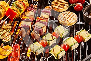 Assorted shish vegan kebabs with tofu and haloumi