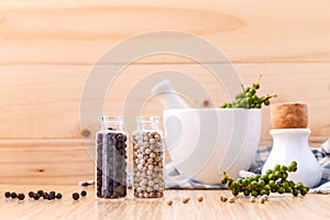 Assorted of spice bottles condiment black pepper ,white pepper a