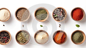 Assorted spices and herbs neatly arranged in wooden bowls on a white background, showcasing variety and vibrant colors