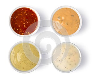 Assorted Spicy Sauces on Saucers,