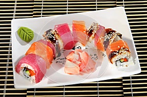 Assorted sushi menu rolls sauce