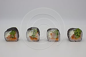 Assorted Sushi Rolls on White Background