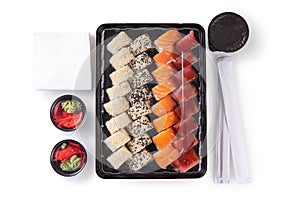 Assorted sushi set with salmon, tuna, seasame served in plastic box takeaway, to go