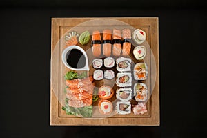 Assorted sushi set served on wooden tray