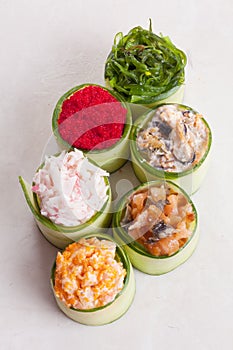 Assorted sushi wrapped in cucumber large masago, shrimp, salmon, crab, Chuka, the six pieces