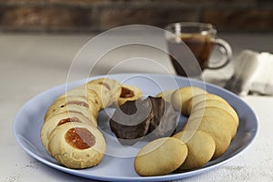 Assorted tea pastes, tea cup and tea bags