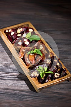 Assorted Turkish Delight bars, Caucasian delicacy churchkhela, Georgian dessert.