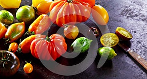Assorted varieties of ripe fresh tomatoes